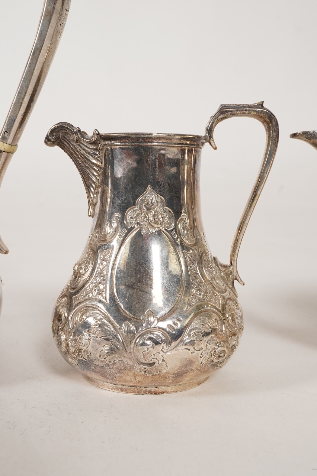 A Victorian embossed silver four piece tea and coffee service by Daniel & Charles Houle